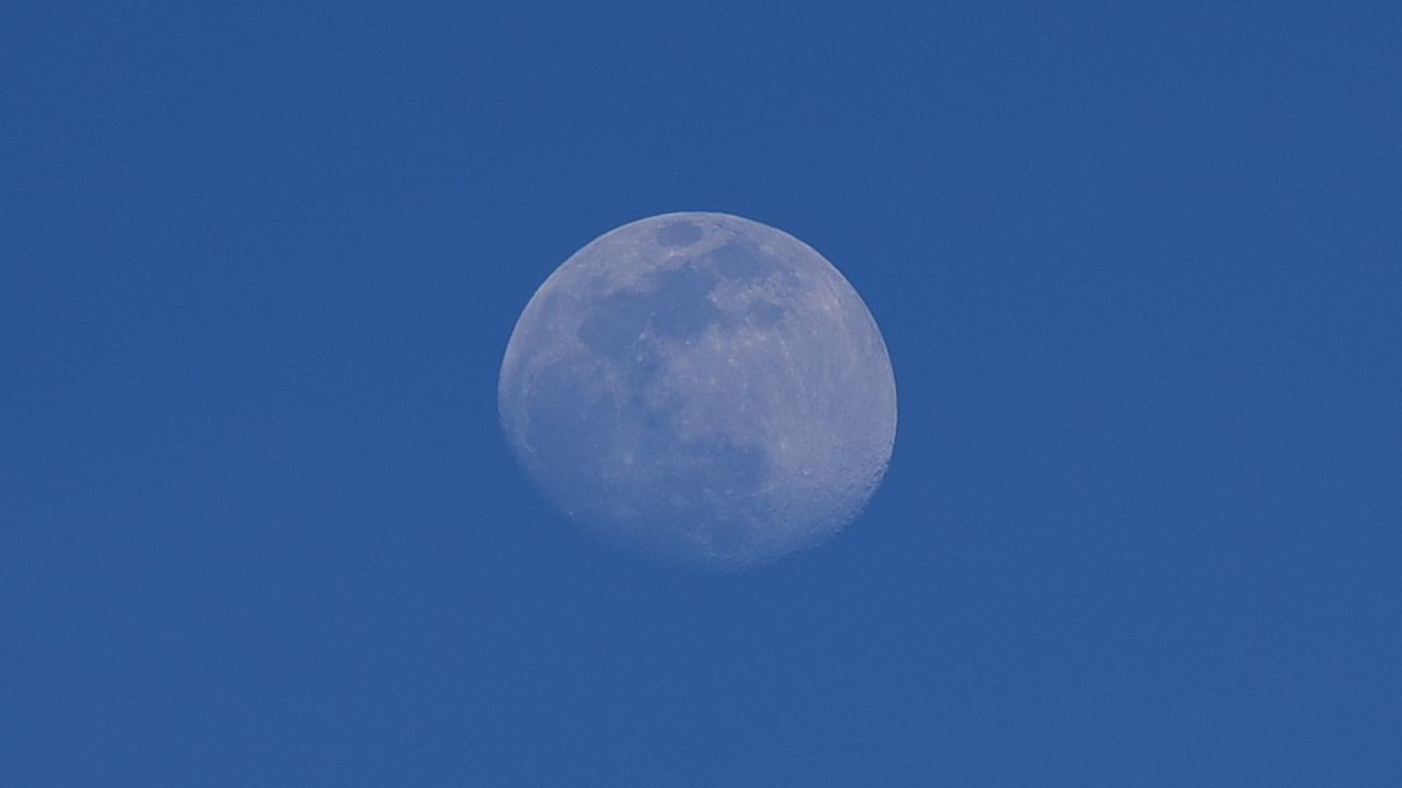 Wallpaper moon, craters, sky, blue, minimalism