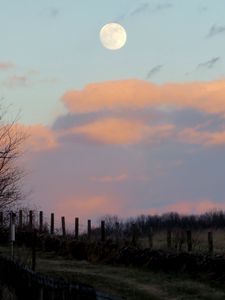 Preview wallpaper moon, dusk, nature, fence, clouds