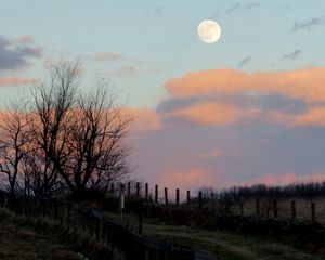 Preview wallpaper moon, dusk, nature, fence, clouds