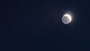 Preview wallpaper moon, eclipse, astronomy, shine, stars