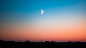 Preview wallpaper moon, evening, city, sky, horizon