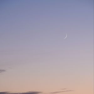 Preview wallpaper moon, evening, grass, clouds