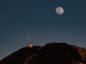 Preview wallpaper moon, hill, tower, trees