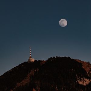 Preview wallpaper moon, hill, tower, trees