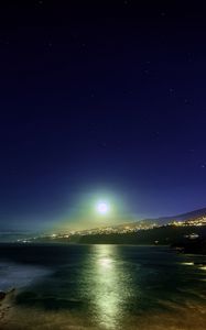 Preview wallpaper moon, moonlight, sea, city, lights, night