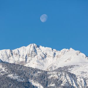 Preview wallpaper moon, mountains, forest, snow, snowy