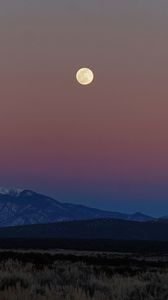 Preview wallpaper moon, mountains, snowy, field, evening