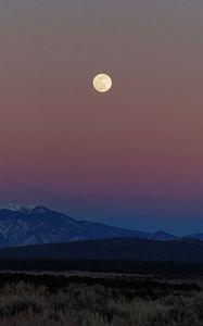 Preview wallpaper moon, mountains, snowy, field, evening