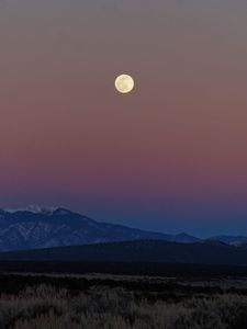 Preview wallpaper moon, mountains, snowy, field, evening
