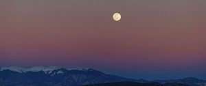Preview wallpaper moon, mountains, snowy, field, evening