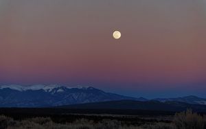 Preview wallpaper moon, mountains, snowy, field, evening