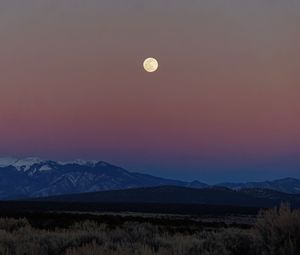 Preview wallpaper moon, mountains, snowy, field, evening