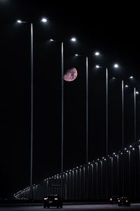 Preview wallpaper moon, night, lights, light, road, dark