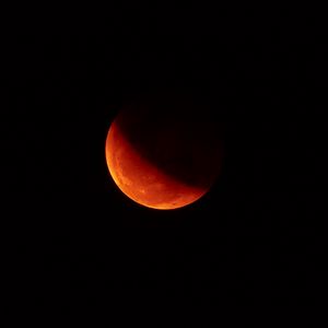Preview wallpaper moon, red, dark, shadow, space