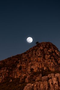 Preview wallpaper moon, rocks, mountains, night, full moon