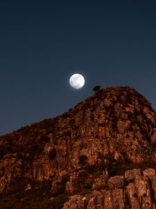 Preview wallpaper moon, rocks, mountains, night, full moon