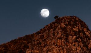 Preview wallpaper moon, rocks, mountains, night, full moon