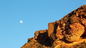 Preview wallpaper moon, rocks, sky, slope