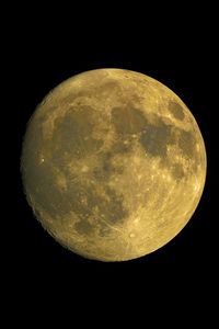 Preview wallpaper moon, satellite, craters, yellow, space