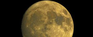 Preview wallpaper moon, satellite, craters, yellow, space