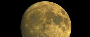 Preview wallpaper moon, satellite, craters, yellow, space