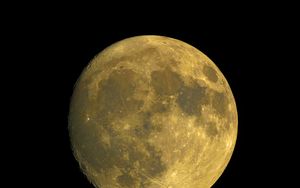 Preview wallpaper moon, satellite, craters, yellow, space