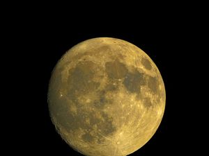 Preview wallpaper moon, satellite, craters, yellow, space