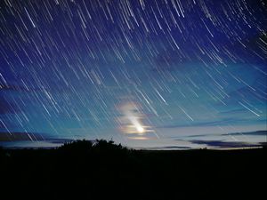 Preview wallpaper moon, star, night, long exposure, movement, darkness