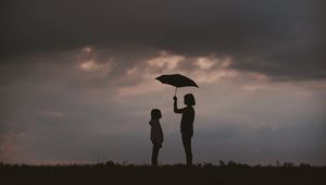 Preview wallpaper mother, child, care, umbrella, silhouettes, sky