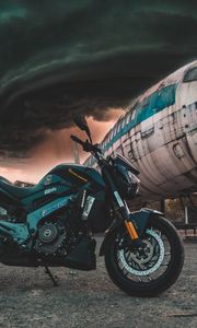 Preview wallpaper motorcycle, airplane, side view, clouds, overcast