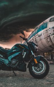 Preview wallpaper motorcycle, airplane, side view, clouds, overcast