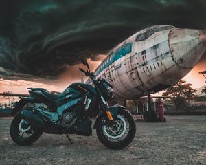 Preview wallpaper motorcycle, airplane, side view, clouds, overcast