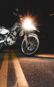 Preview wallpaper motorcycle, asphalt, headlights, light