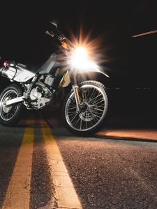Preview wallpaper motorcycle, asphalt, headlights, light