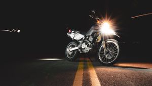Preview wallpaper motorcycle, asphalt, headlights, light