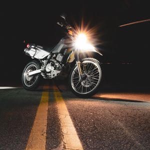 Preview wallpaper motorcycle, asphalt, headlights, light