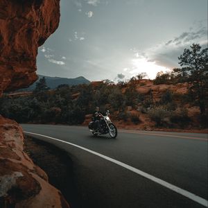 Preview wallpaper motorcycle, bike, biker, rider, road, rocks