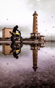 Preview wallpaper motorcycle, bike, biker, tower, water, reflection