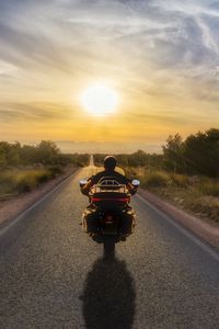 Preview wallpaper motorcycle, bike, biker, motorcyclist, road, sunset