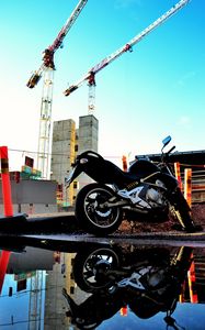 Preview wallpaper motorcycle, bike, black, reflection, water, constructing