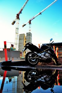 Preview wallpaper motorcycle, bike, black, reflection, water, constructing