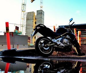 Preview wallpaper motorcycle, bike, black, reflection, water, constructing