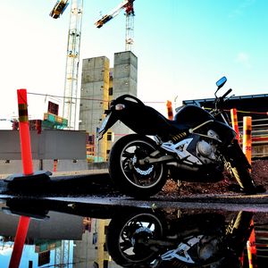 Preview wallpaper motorcycle, bike, black, reflection, water, constructing