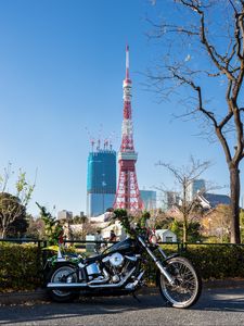 Preview wallpaper motorcycle, bike, black, buildings, tower