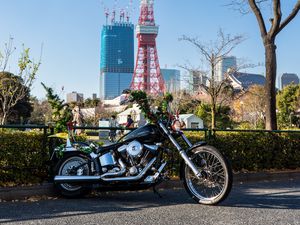 Preview wallpaper motorcycle, bike, black, buildings, tower