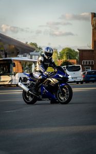 Preview wallpaper motorcycle, bike, blue, motorcyclist, helmet, road