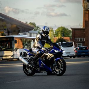 Preview wallpaper motorcycle, bike, blue, motorcyclist, helmet, road