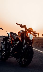 Preview wallpaper motorcycle, bike, front view, headlight, sunset
