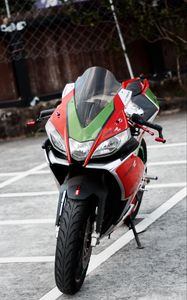 Preview wallpaper motorcycle, bike, green, red, parking, moto