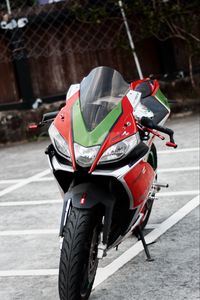Preview wallpaper motorcycle, bike, green, red, parking, moto